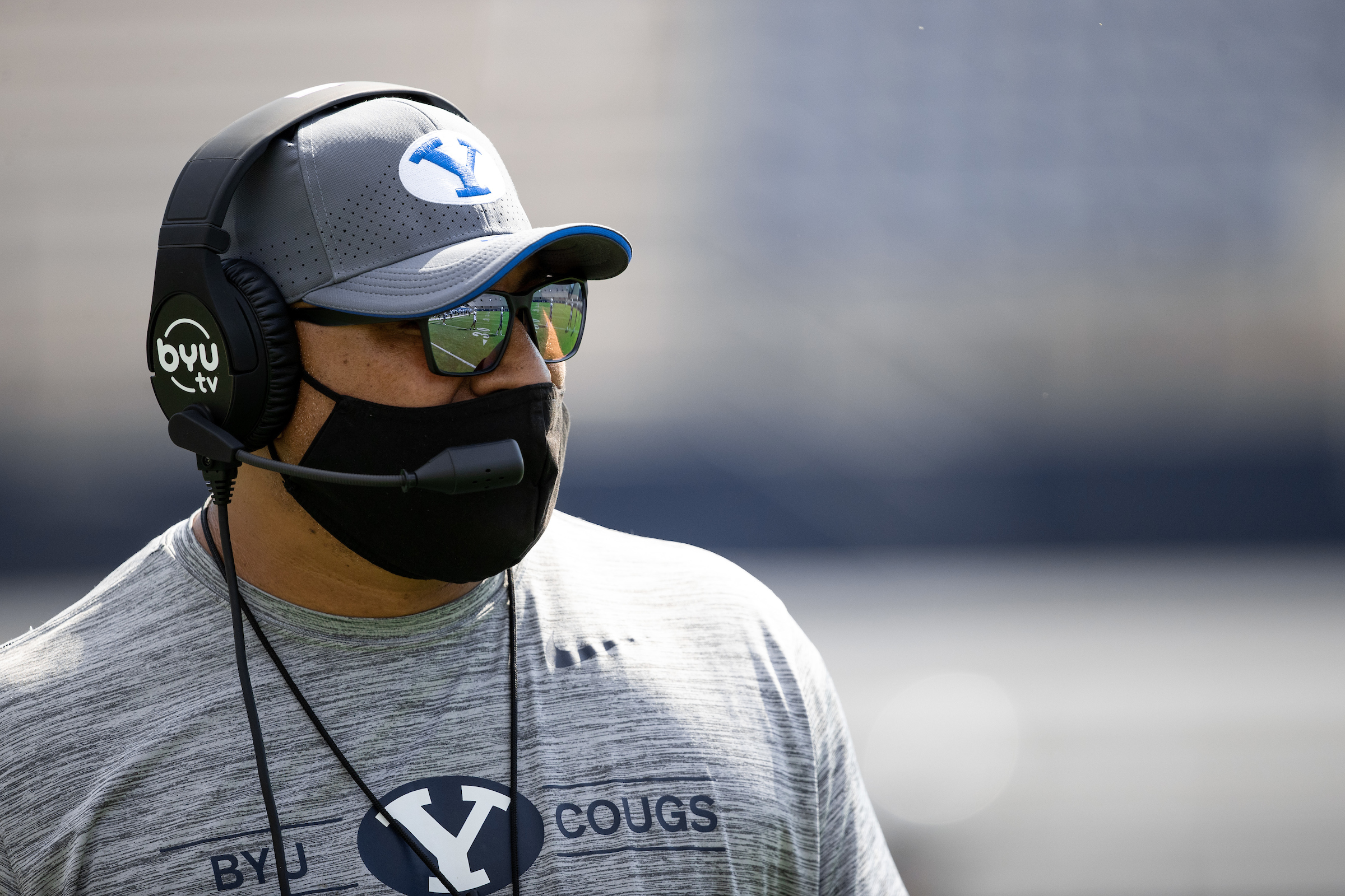 BYU coach Kalani Sitake wears a mask during a scrimmage at LaVell Edwards Stadium wearing masks, Thursday, Aug. 20, 2020 in Provo.
