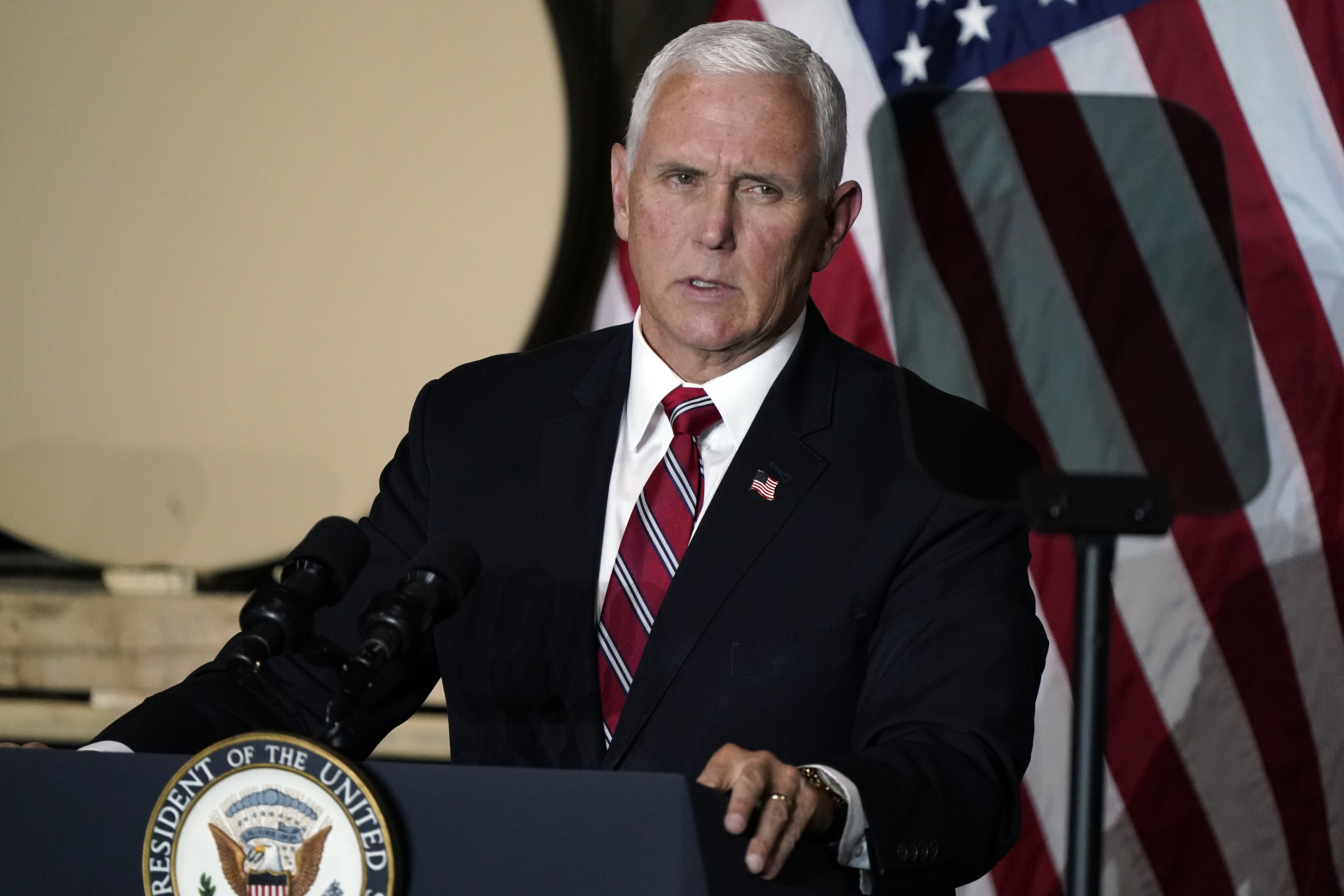 After Trump praise, Pence decries QAnon 'conspiracy theory'