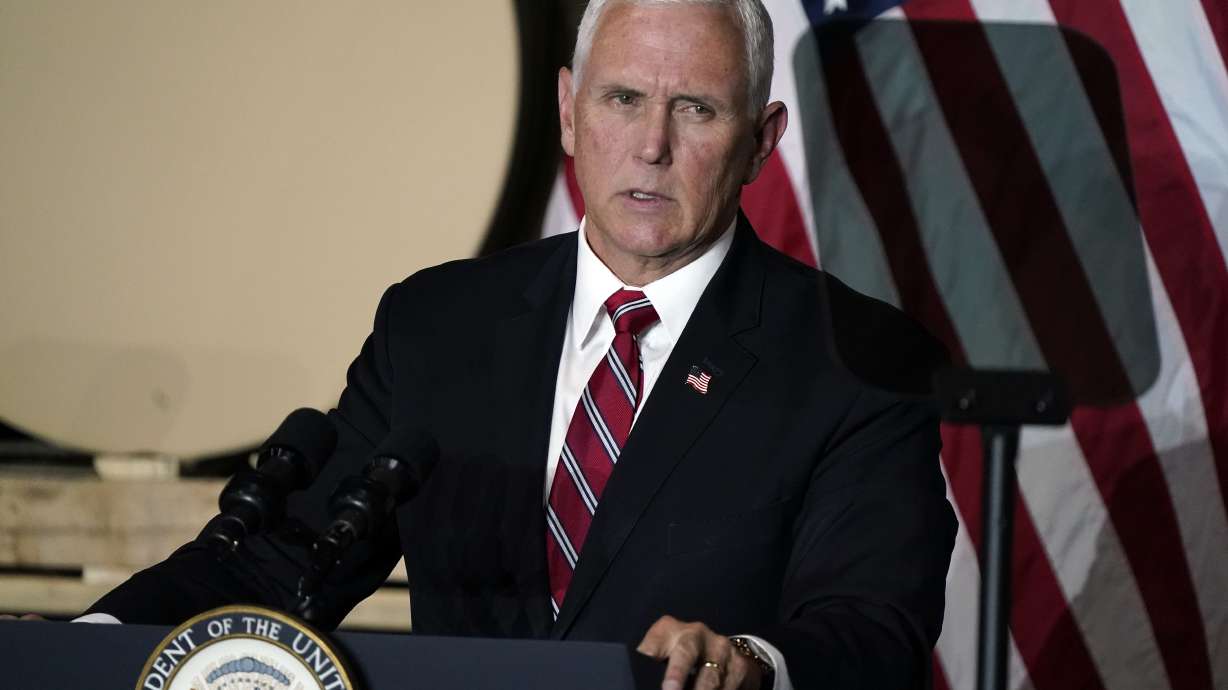 After Trump praise, Pence decries QAnon 'conspiracy theory'