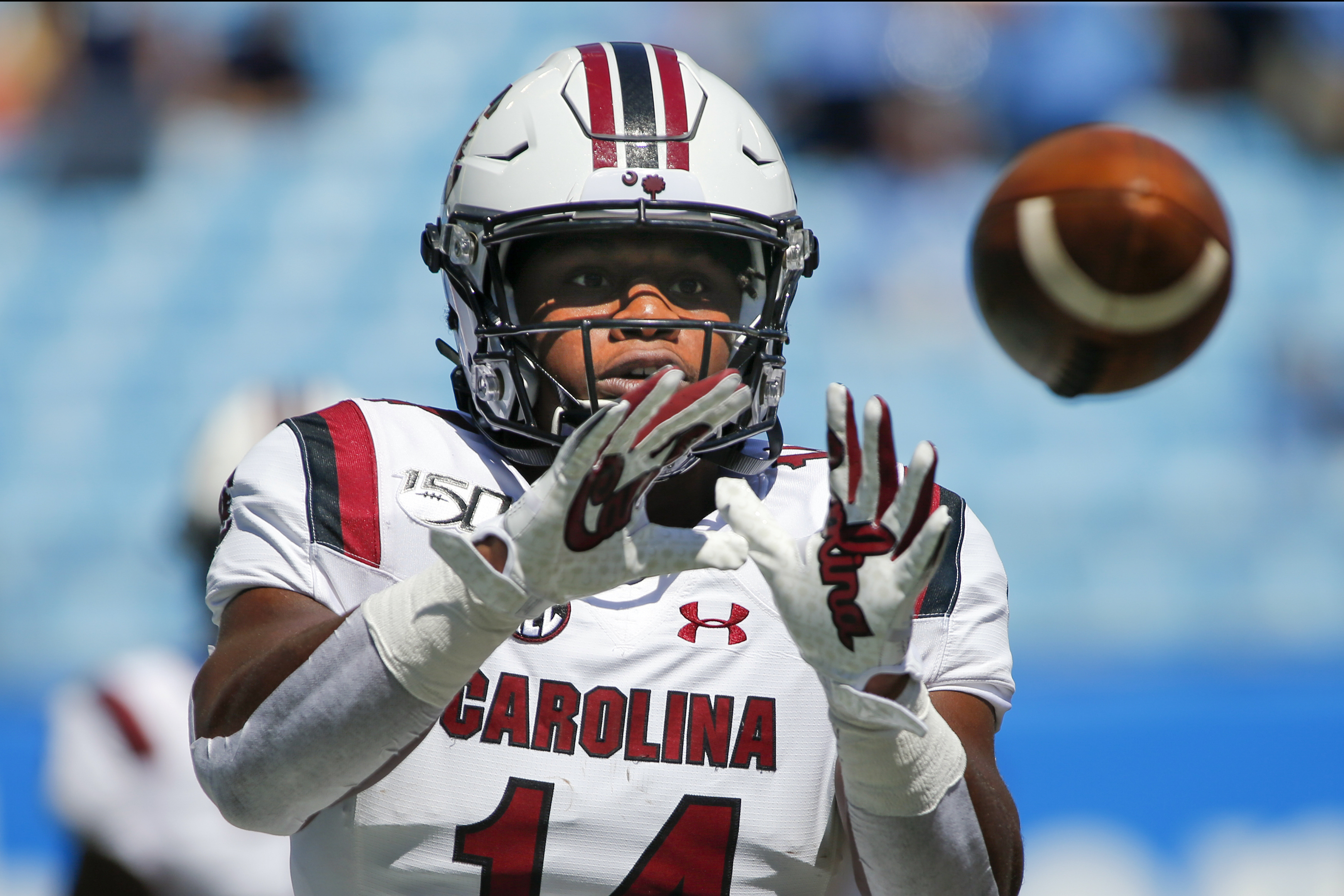 In this Aug. 31, 2019, file photo, South Carolina running back Deshaun Fenwick warms up prior to an NCAA college football game against North Carolina in Charlotte, N.C. For the college athletes who are heading into a season of uncertainty brought on by COVID-19, the NCAA's decision to not charge them a year of eligibility, no matter how much they play, brings peace of mind.