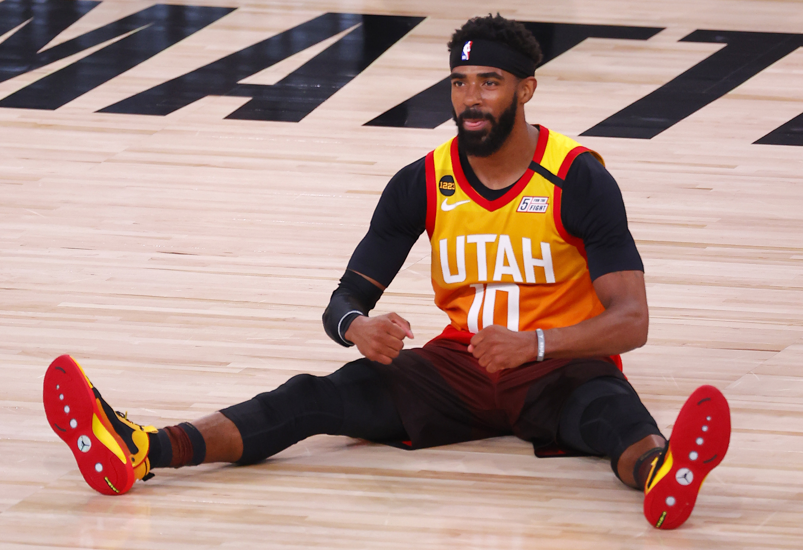 Utah Jazz's Mike Conley reacts after being fouled during the third quarter of Game 3 of an NBA basketball first-round playoff series against the Denver Nuggets, Friday, Aug. 21, 2020, in Lake Buena Vista, Fla. 