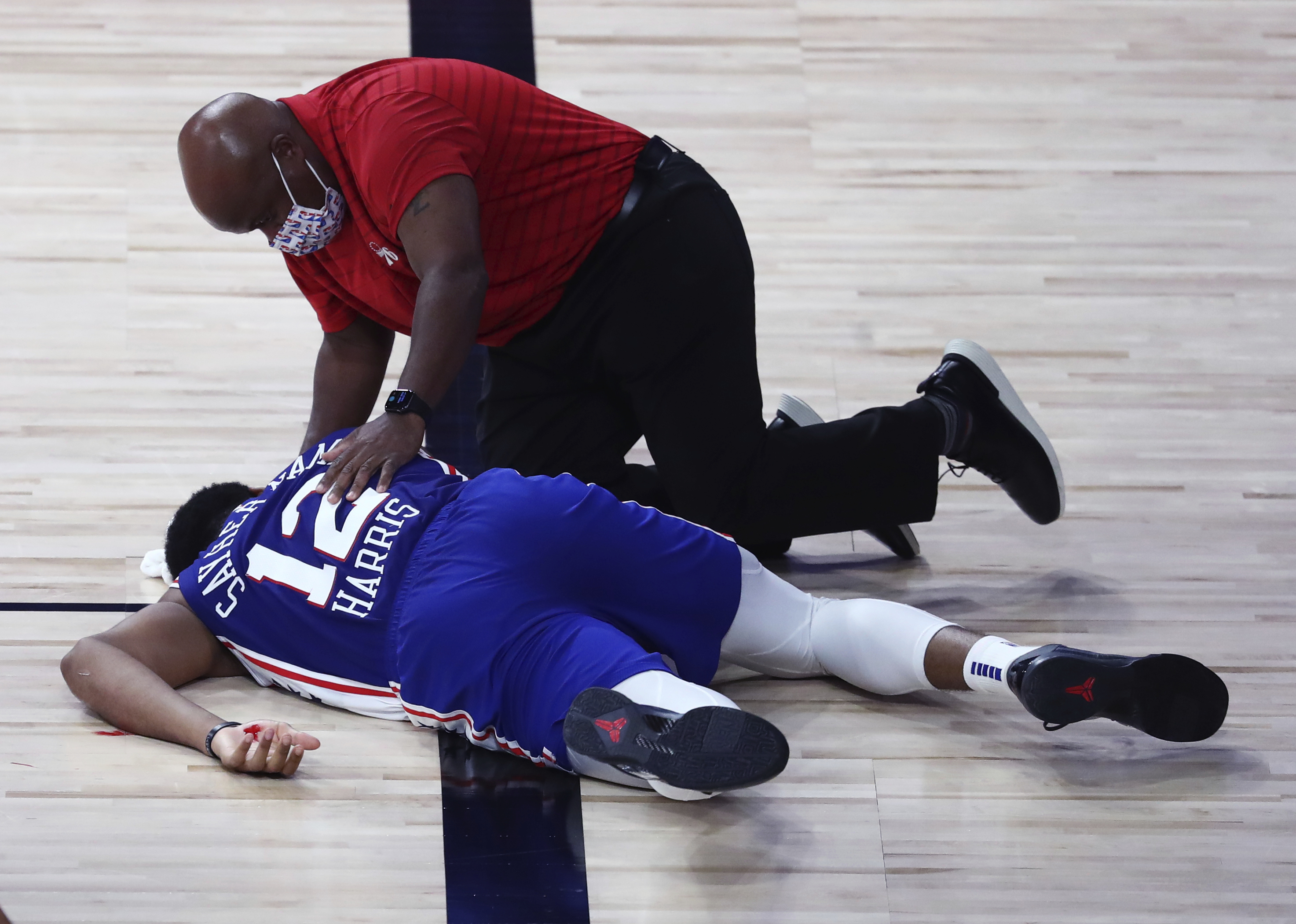 76ers' Tobias Harris falls in Game 3 vs. Celtics, cuts eye