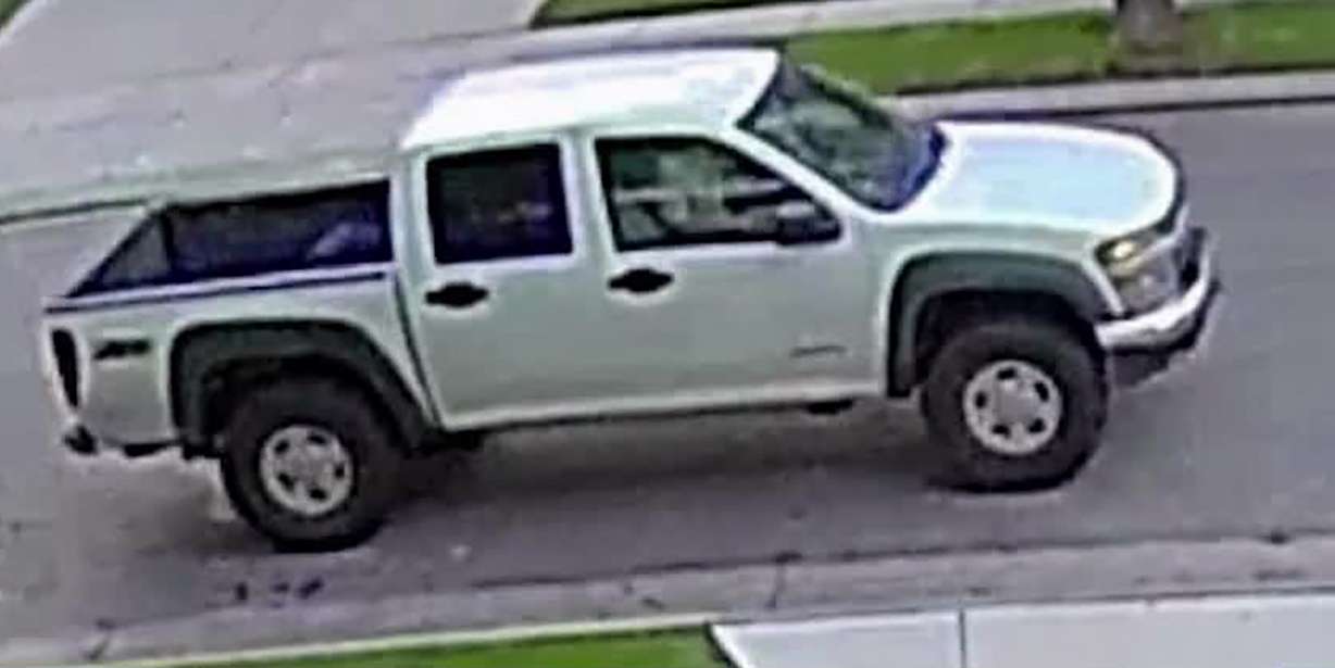 Surveillance images and video show a white, four-door Chevy Colorado pickup truck, police say Monday, Aug. 24, 2020.