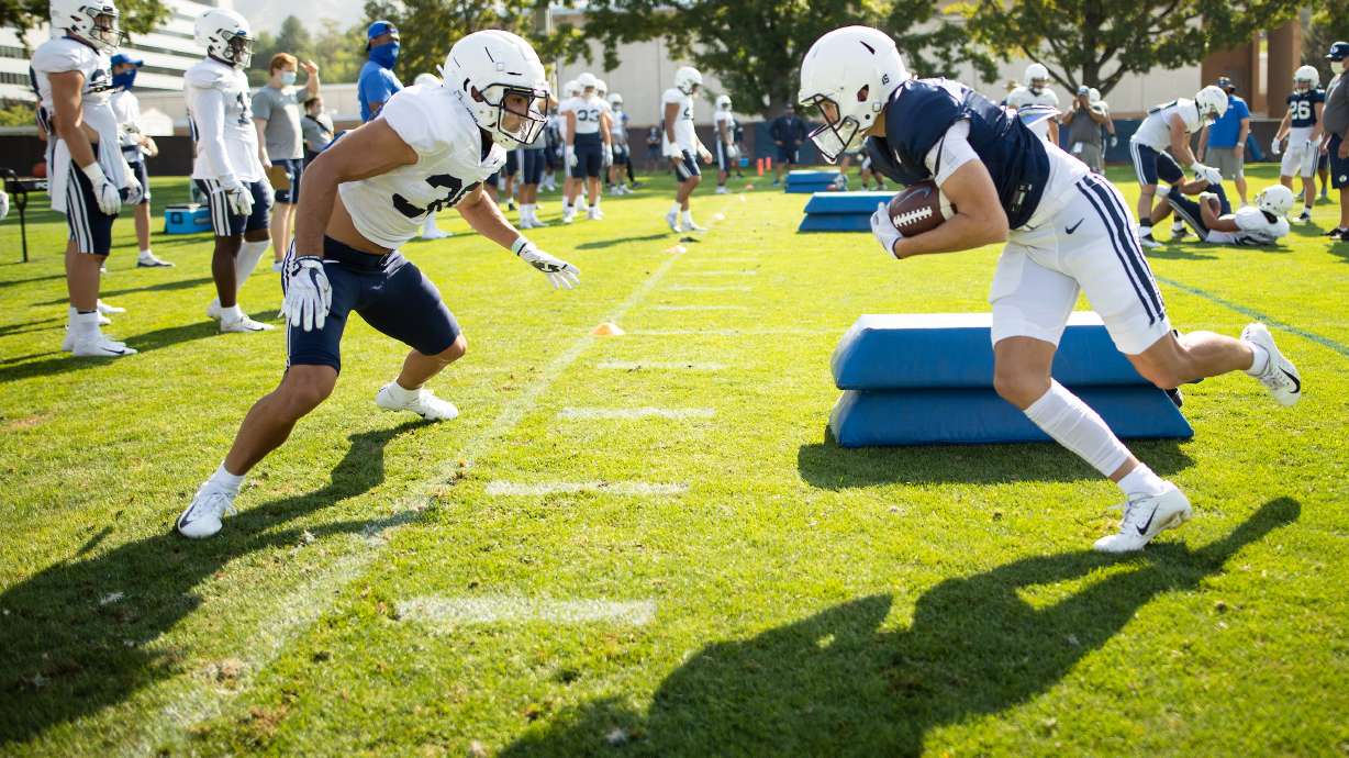 Jason Money and Kade Moore 20FTB PRAC 8-25 206
20FTB PRAC 8-25
2020 BYU Football Fall Camp
August 25, 2020
Photo by Jaren Wilkey/BYU
© BYU PHOTO 2020
All Rights Reserved
photo@byu.edu (801)422-7322