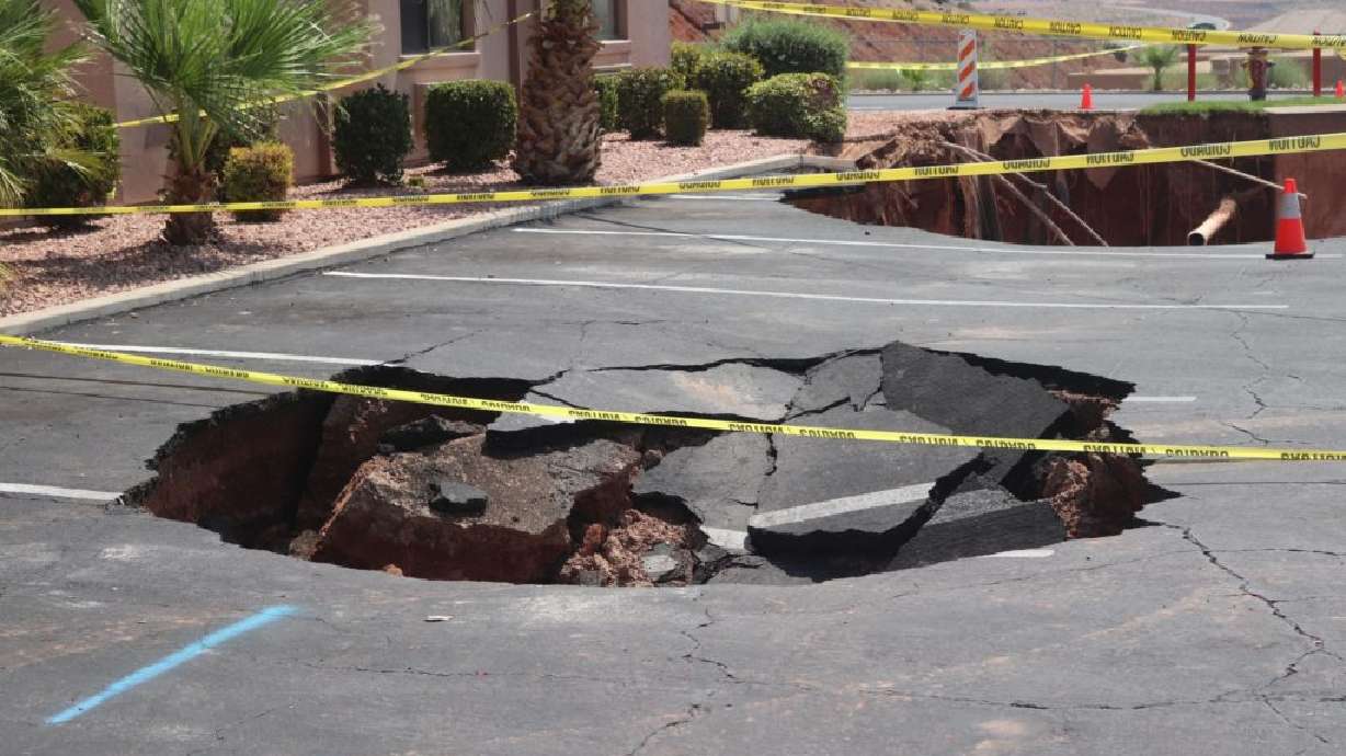Two sinkholes form in the parking lot of the Ramada Inn on St. George Boulevard, St. George, Utah, Aug. 25, 2020 | Photo by Mori Kessler, St. George News