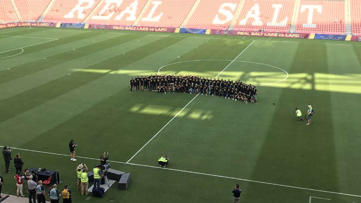 RSL and LAFC players gather at midfield in solidarity before a postponed match, Wednesday, Aug. 26, 2020 at Rio Tinto Stadium in Sandy.