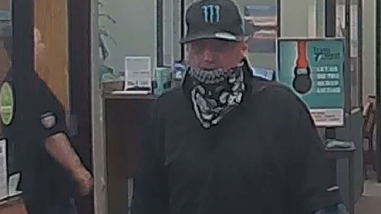 Security footage of an alleged robber at a bank in Sandy on Aug. 21, 2020.