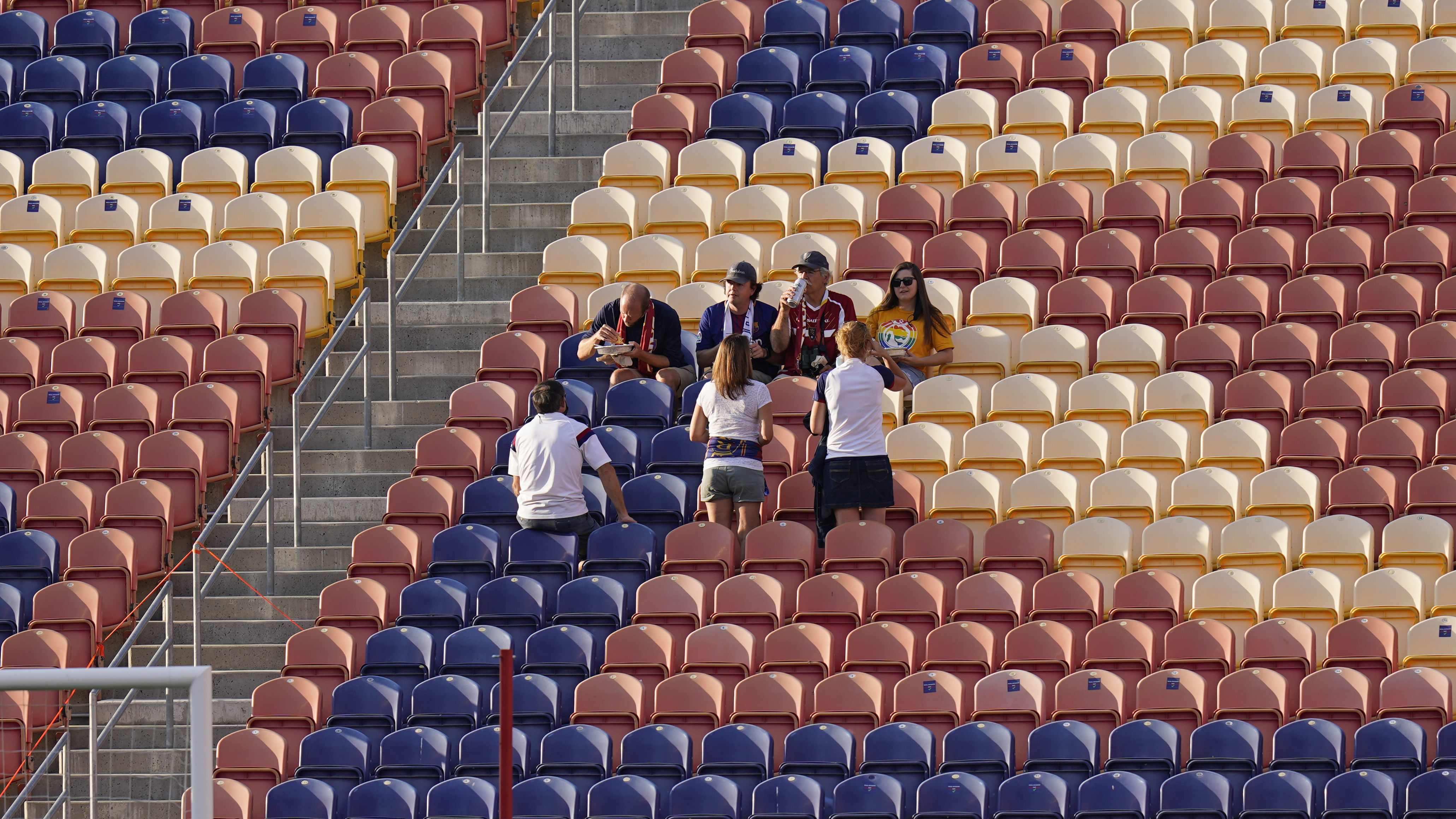 A few fans remain in the stands after the scheduled MLS game between Real Salt Lake and Los Angeles FC was postponed Wednesday, Aug. 26, 2020, in Sandy, Utah. Major League Soccer players boycotted five games Wednesday night in a collective statement against racial injustice. The players' action came after all three NBA playoff games were called off in a protest over the police shooting of Jacob Blake in Wisconsin on Sunday night.