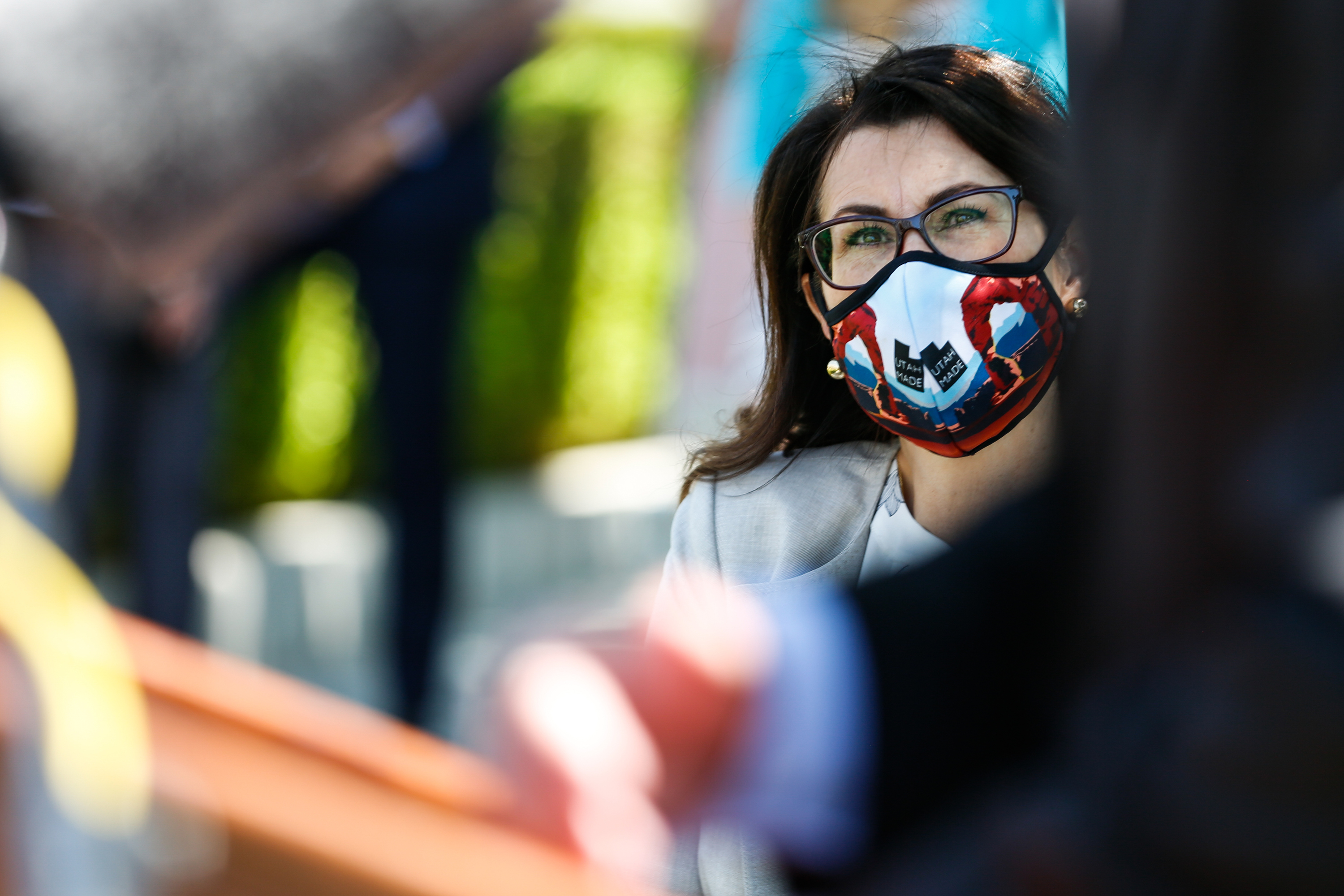 State Sen. Deidre Henderson, R-Spanish Fork and GOP nominee for lieutenant governor, listens as running mate Lt. Governor Spencer Cox speaks during a press conference outside of the Capitol in Salt Lake City on Tuesday, July 7, 2020. On Monday, Cox and Henderson were declared the winners in the GOP gubernatorial primary.