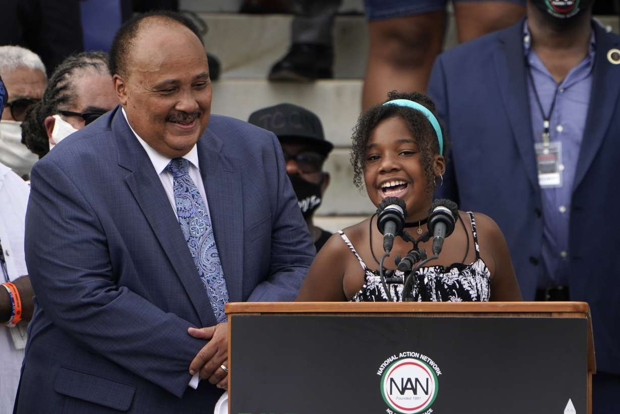 Yolanda Renee King, granddaughter of Martin Luther King Jr., speaks at the March on Washington, Friday Aug. 28, 2020, at the Lincoln Memorial in Washington. At left is her father Martin Luther King, III.