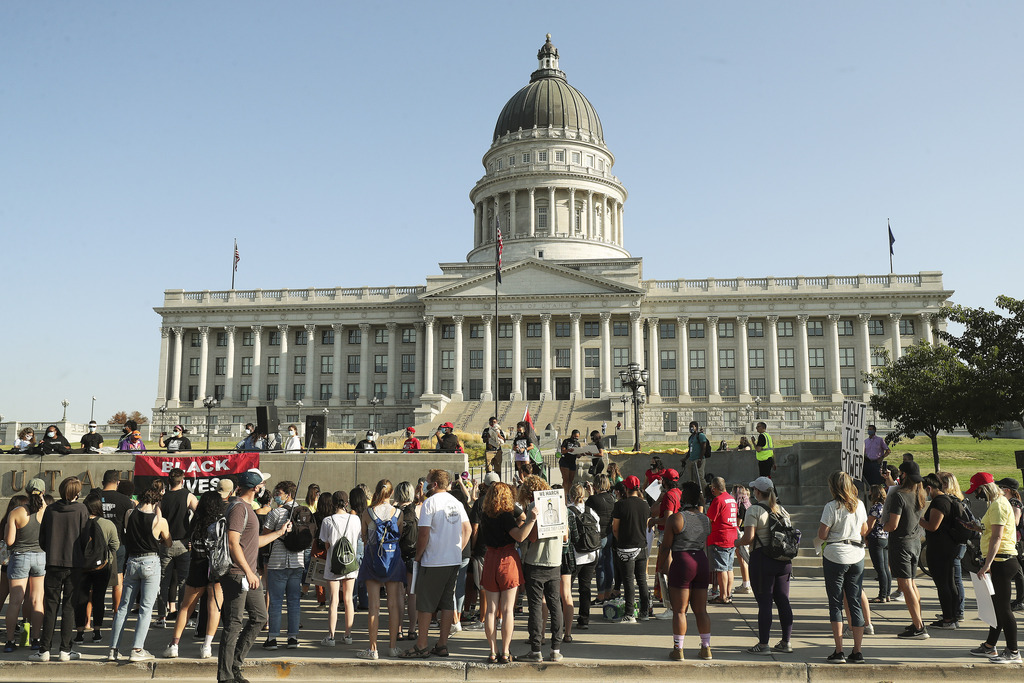 Activists gather at the Capitol in Salt Lake City on Friday, Aug. 28, 2020. The march commemorated the 57th anniversary of the historic March on Washington for Jobs and Freedom, where Dr. Martin Luther King Jr. delivered his "I Have a Dream" speech.