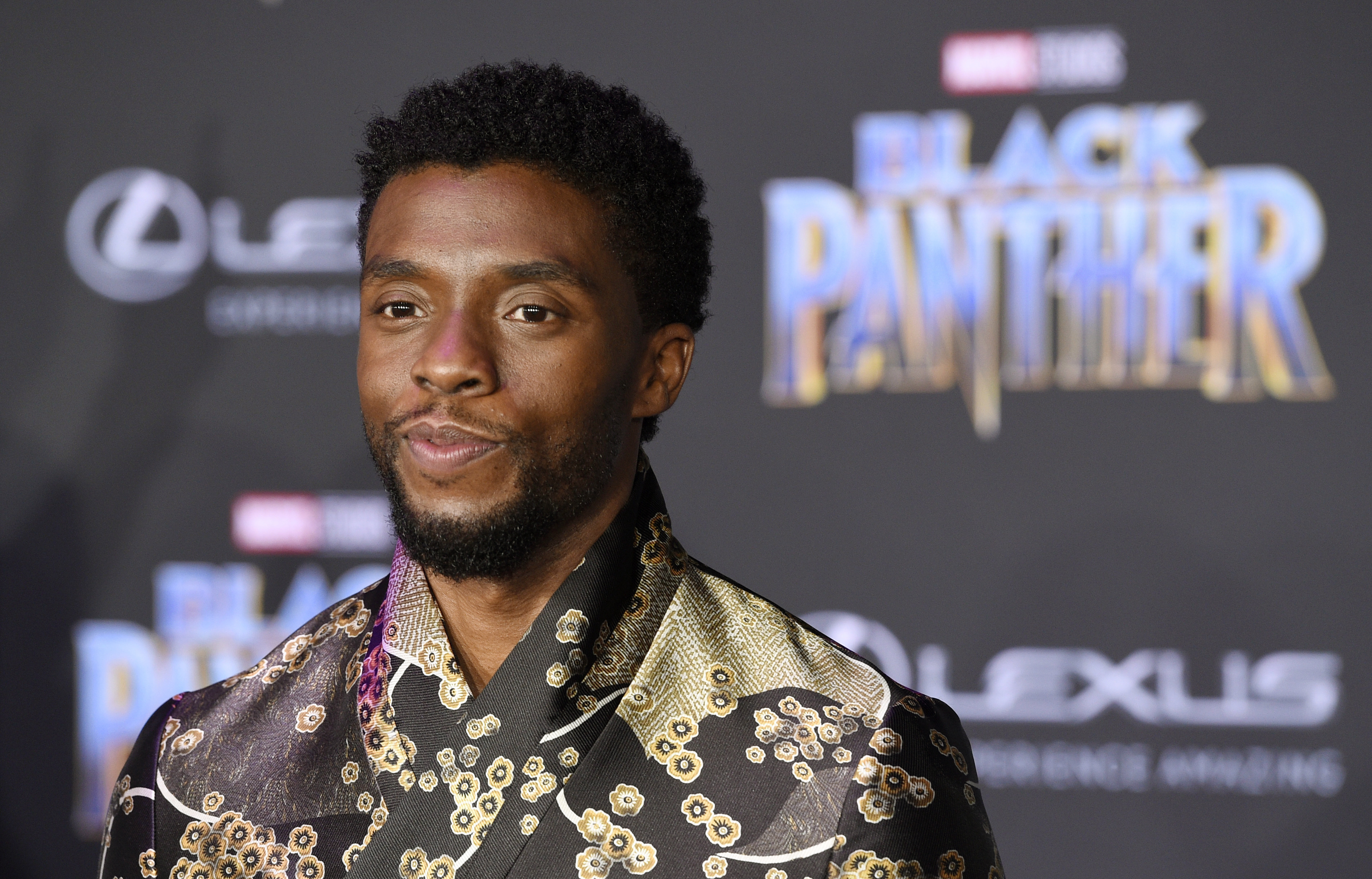 FILE - In this Jan. 29, 2018 file photo, Chadwick Boseman, a cast member in "Black Panther," poses at the premiere of the film in Los Angeles. Actor Chadwick Boseman, who played Black icons Jackie Robinson and James Brown before finding fame as the regal Black Panther in the Marvel cinematic universe, has died of cancer. His representative says Boseman died Friday, Aug. 28, 2020 in Los Angeles after a four-year battle with colon cancer. He was 43. (Photo by Chris Pizzello/Invision/AP, File) [Aug-28-2020]