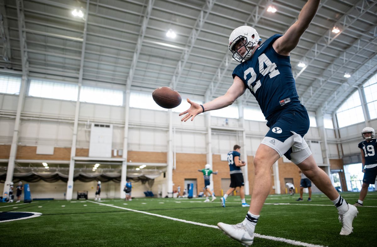 BYU punter Ryan Rehkow practices in the Cougars' indoor practice facility in Provo.