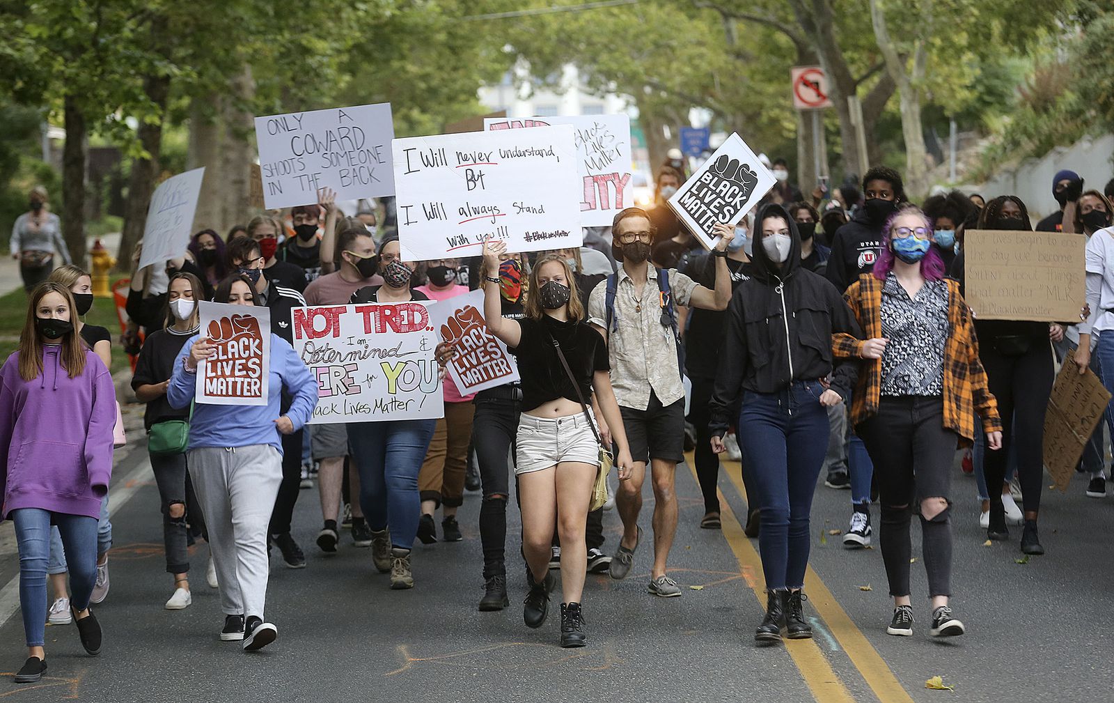 Protesters march down State Street during a Justice for Jacob Blake rally, hosted by the Salt Lake Equal Rights Movement, in Salt Lake City on Monday, Aug. 31, 2020.