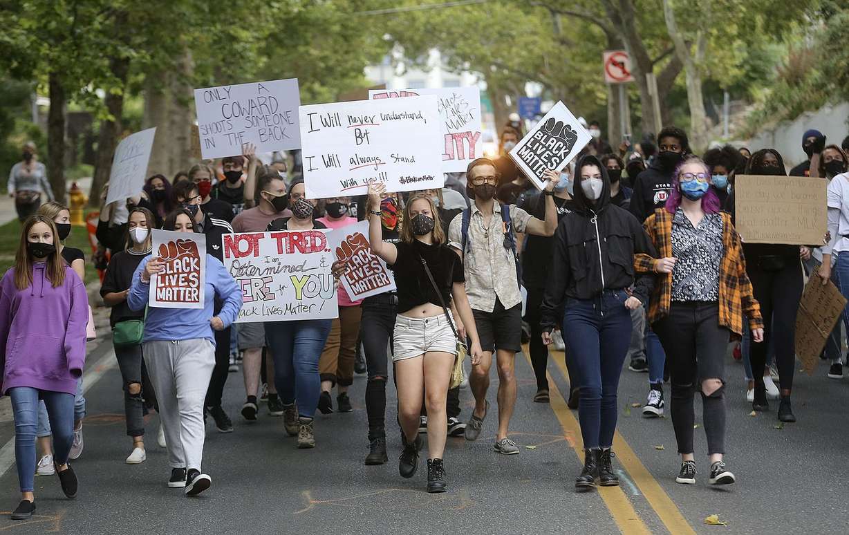Protesters march down State Street during a Justice for Jacob Blake rally, hosted by the Salt Lake Equal Rights Movement, in Salt Lake City on Monday, Aug. 31, 2020.