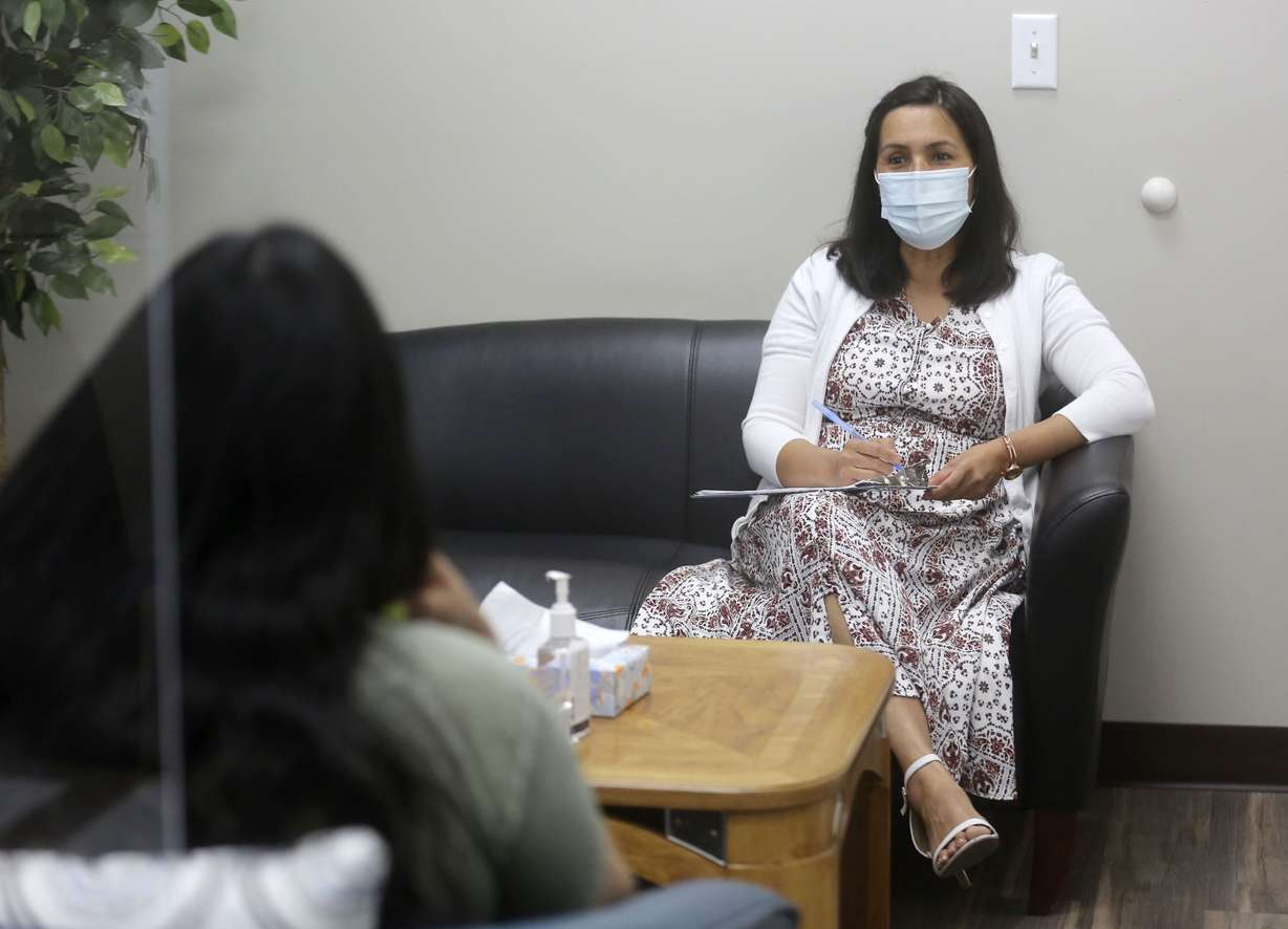Abigail Gonzalez, licensed clinical social worker, meets with a client at Utah Partners for Health Midvale Clinic in Midvale on Tuesday, Sept. 1, 2020. The Mental Health Professionals Workforce Shortage Loan Repayment Act would provide school loan forgiveness to mental and behavioral health professionals working in underserved areas in an effort to increase the number of mental health providers in low-income and rural communities.