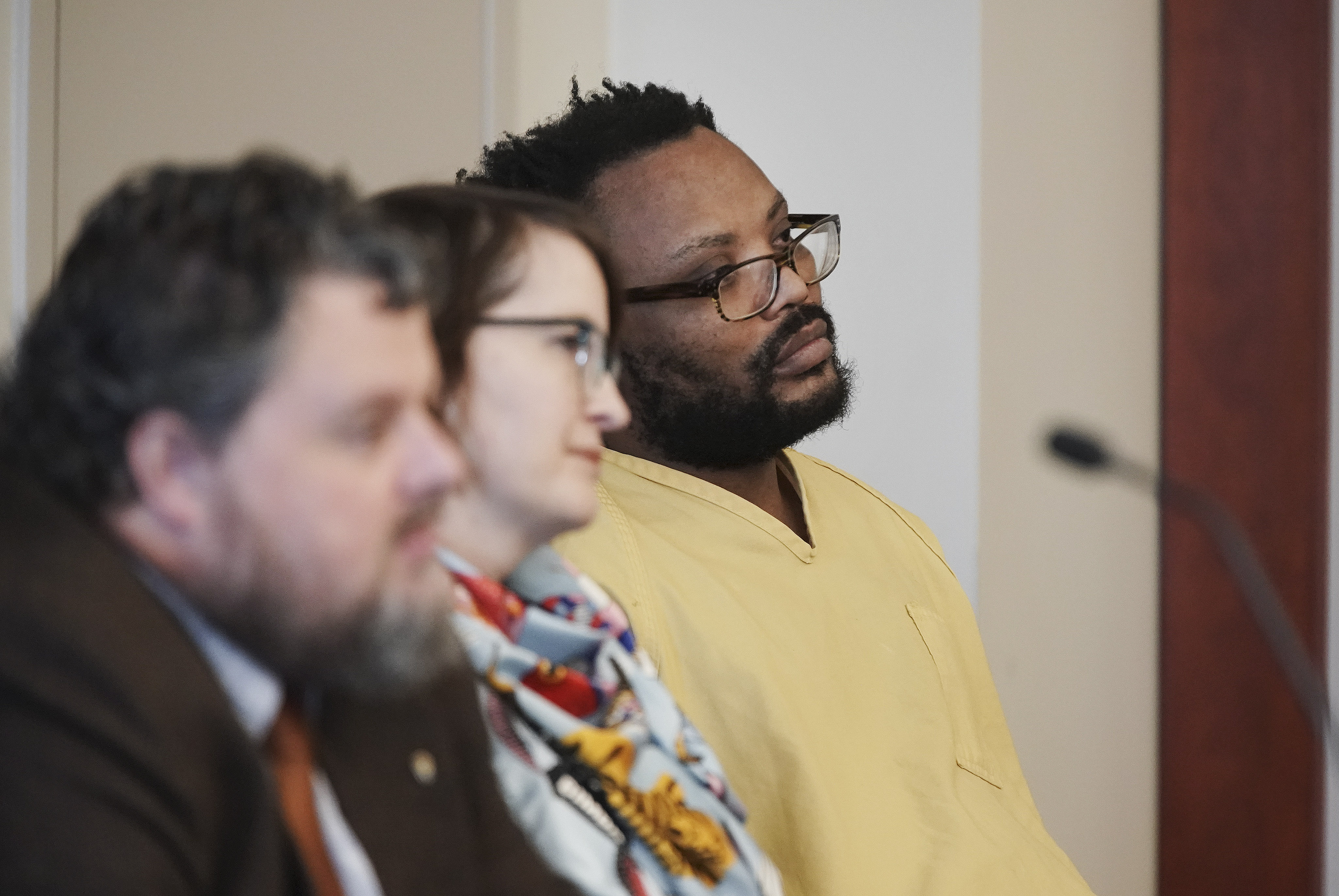 Ayoola Adisa Ajayi, accused in the June killing of University of Utah student Mackenzie Lueck, appears in 3rd District Court with attorneys Neal Hamilton and M.E. Larson on another case where he is charged with kidnapping and sexually assaulting a woman in 2018, in Salt Lake City on Friday, Dec. 20, 2019.