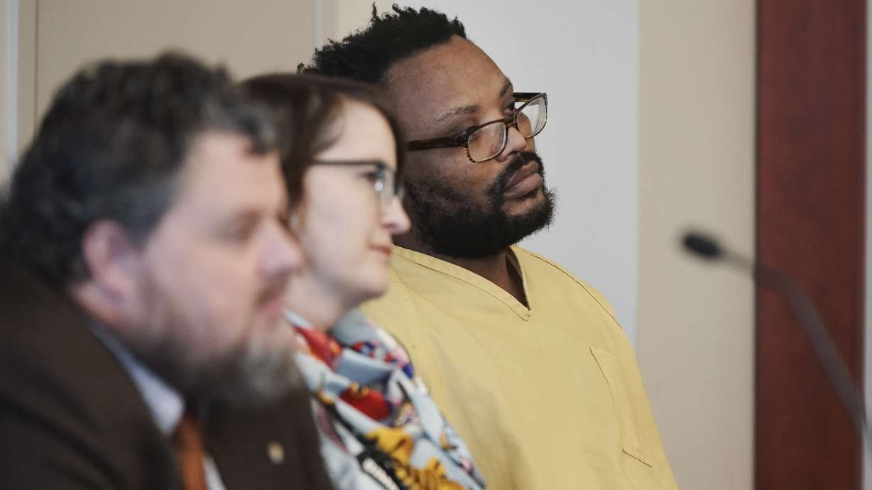 Ayoola Adisa Ajayi, accused in the June killing of University of Utah student Mackenzie Lueck, appears in 3rd District Court with attorneys Neal Hamilton and M.E. Larson on another case where he is charged with kidnapping and sexually assaulting a woman in 2018, in Salt Lake City on Friday, Dec. 20, 2019.
