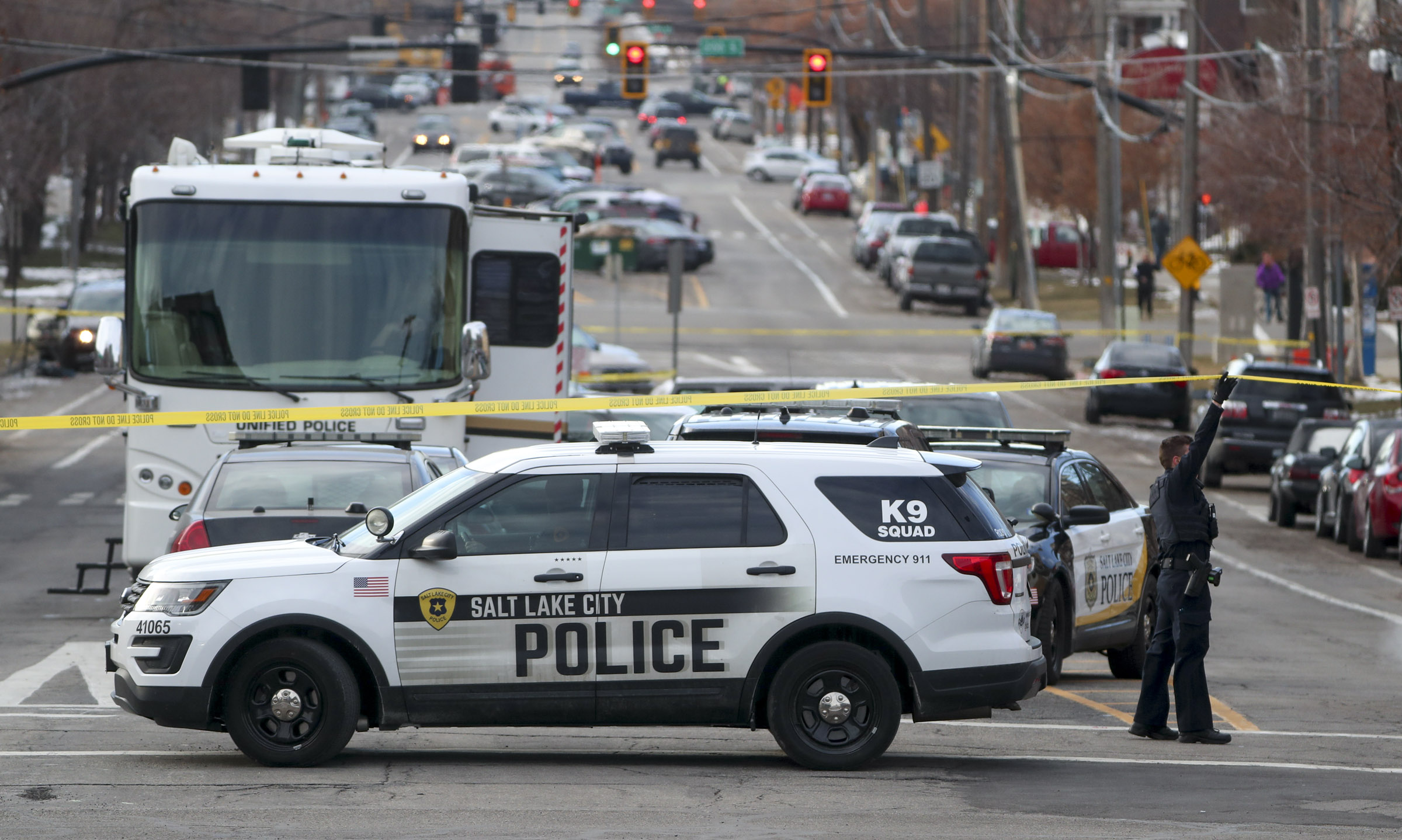 Police investigate an officer-involved shooting after responding to a downtown disturbance in Salt Lake City, on Monday, Feb. 10, 2020.