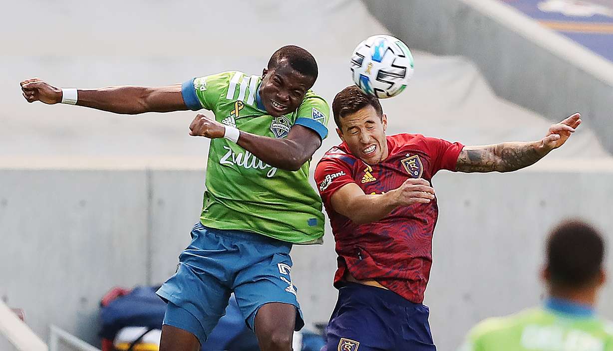 Seattle Sounders defender Nouhou Tolo (5) and Real Salt Lake defender Aaron Herrera (22) battle for the ball as Real Salt Lake and Seattle play an MLS soccer game at Rio Tinto Stadium in Sandy Utah on Wednesday, Sept. 2, 2020. The two teams battled to a 2-2 draw.