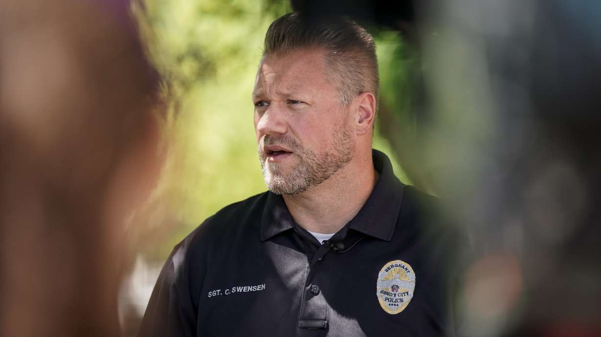 Sandy Police Sgt. Clayton Swensen talks to the media outside the Sandy police department in on Thursday, July 23, 2020.