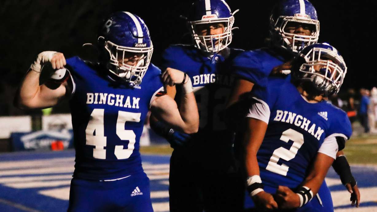 Bingham players celebrate as Saia Lomu (2) scores the team's winning touchdown against Timpview during a high school football game at Bingham High School in South Jordan on Thursday, Sept. 3, 2020.