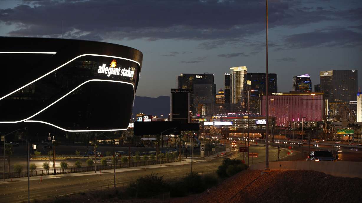 Lights adorn Allegiant Stadium, new home of the Las Vegas Raiders football team, as it nears completion Wednesday, July 22, 2020, in Las Vegas. The stadium will also serve as the home for the UNLV football team.