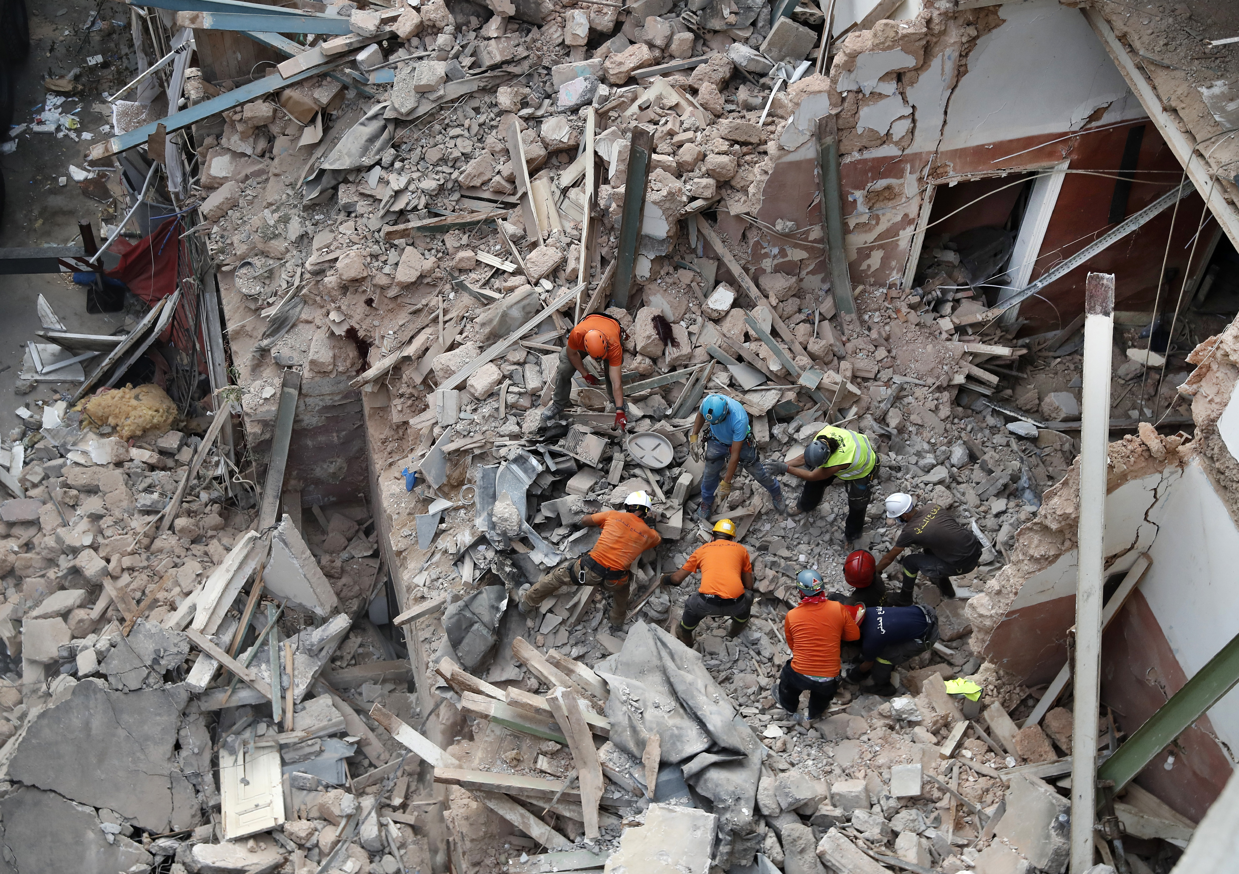 Survivor search grips a grieving Beirut a month after blast
