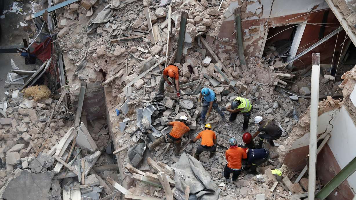 Survivor search grips a grieving Beirut a month after blast