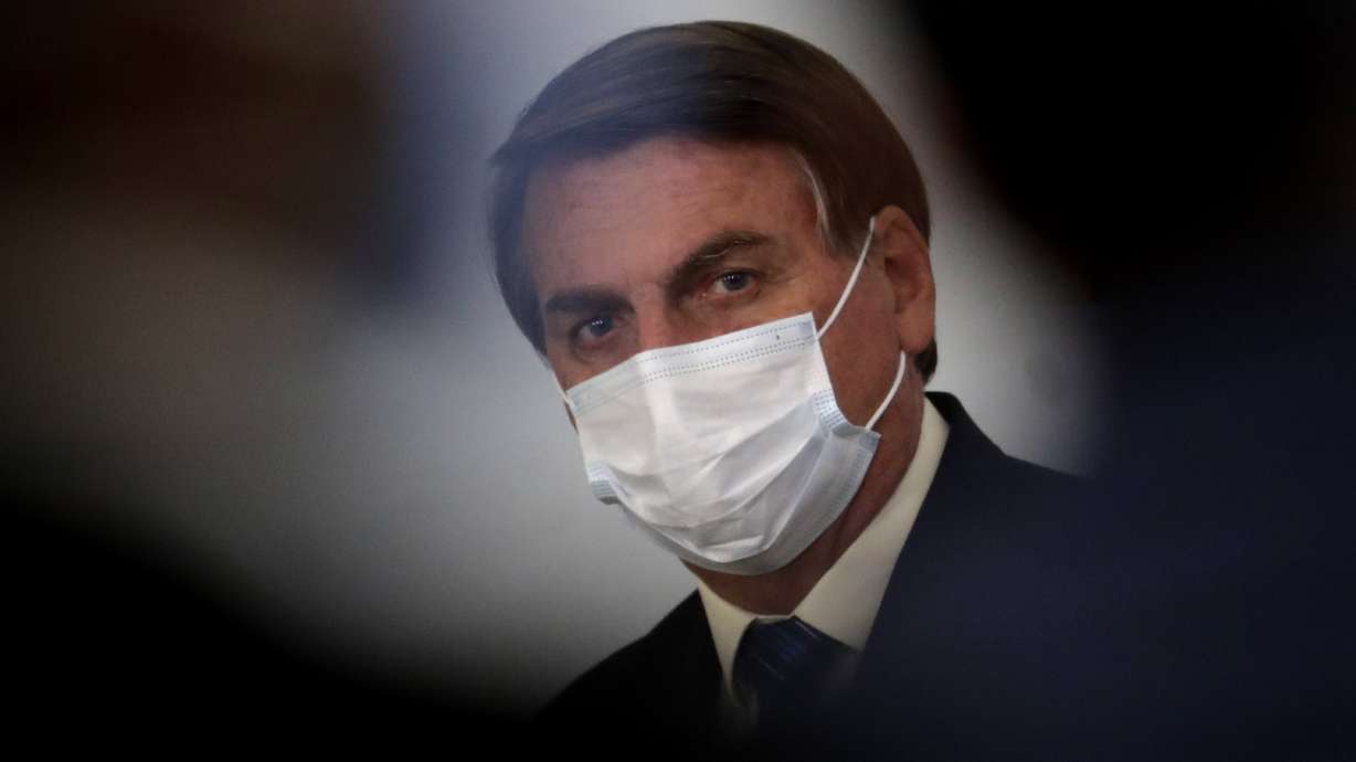 Brazil leader rapped for stirring doubt on COVID-19 vaccine