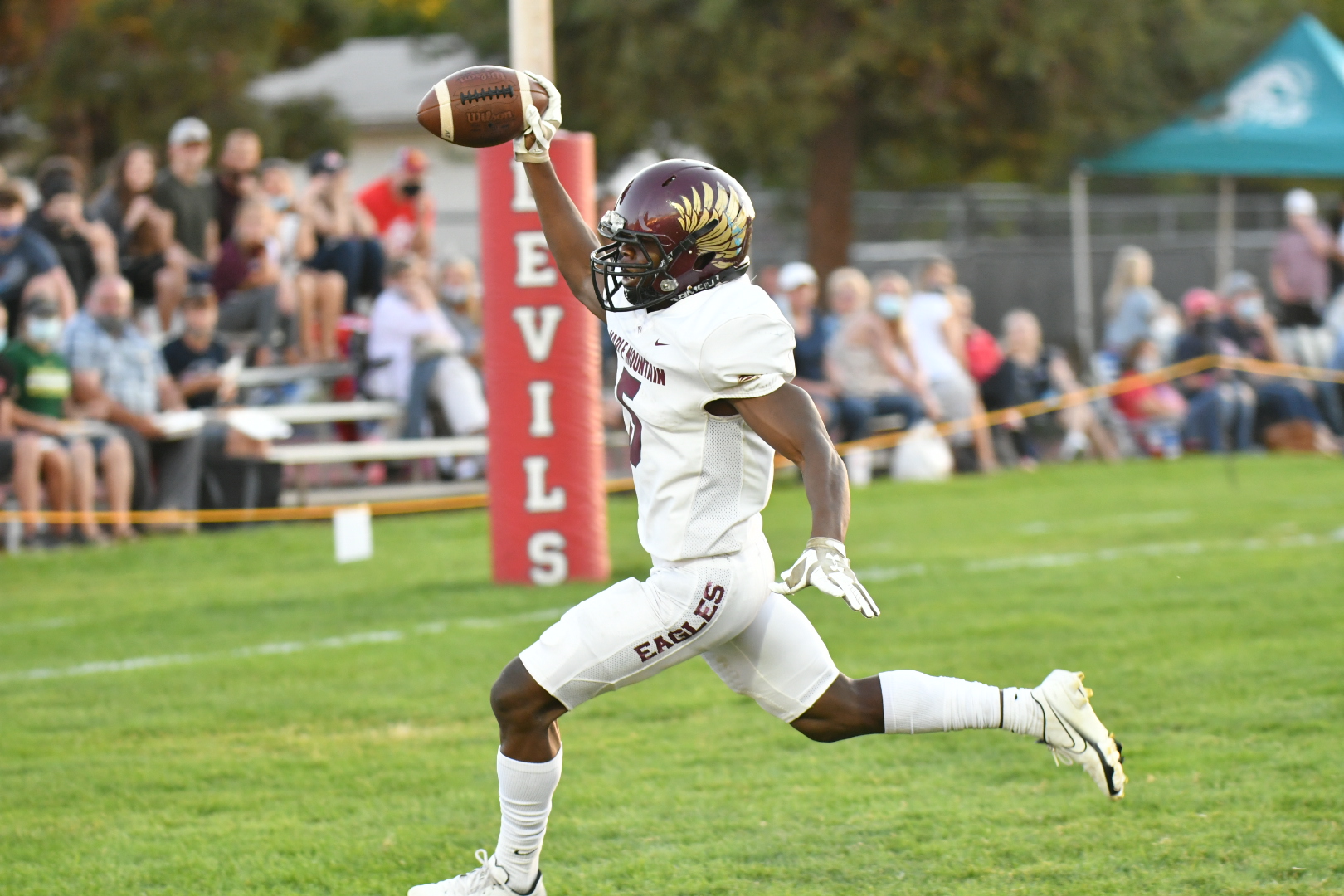 Thomas Weight scores one of his three touchdowns for Maple Mountain in the Golden Eagles' 29-15 win over rival Springville, the school's first win in the series since 2012. 