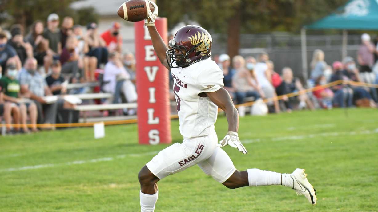 Thomas Weight scores one of his three touchdowns for Maple Mountain in the Golden Eagles' 29-15 win over rival Springville, the school's first win in the series since 2012.