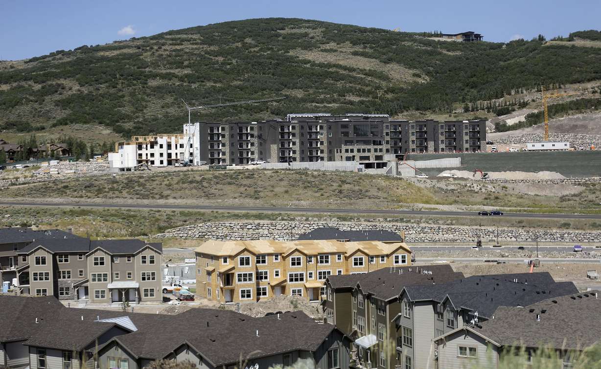 Construction continues on both sides of land that the town of Hideout plans to annex in Wasatch County on Monday, July 20, 2020. The annexation plan includes hundreds of acres from Summit County and Wasatch County, including the land on both sides of state Route 248, pictured between the developments.
