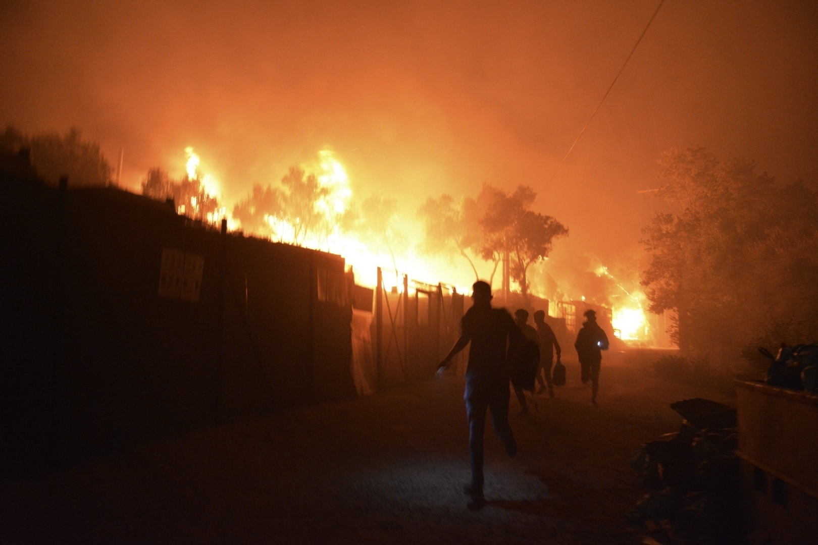 New fire breaks out in crowded refugee camp on Greek island