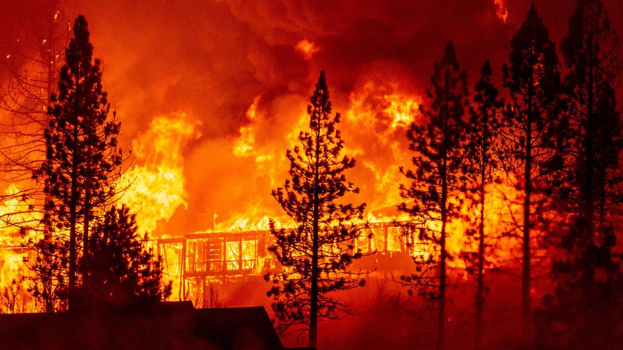 A home is engulfed in flames during the "Creek Fire" in the Tollhouse area of unincorporated Fresno County, California early on Sept. 8, 2020.