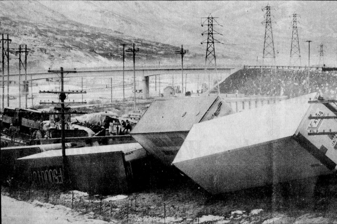 An image of four railroad cars that were blown off a Union Pacific railroad ttrack in Farmington on Monday, April 4, 1983. The image appeared in the Davis County Clipper, which reported that the storm caused thousands of dollars in damage and closed schools in the area.