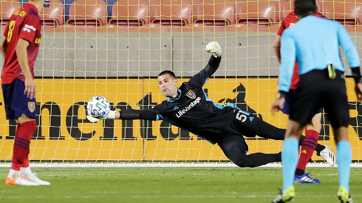 Real Salt Lake goalkeeper Andrew Putna (51) deflects a shot as Real Salt Lake and Los Angeles FC play an MLS game at Rio Tinto Stadium in Sandy on Wednesday, Sept. 9, 2020.