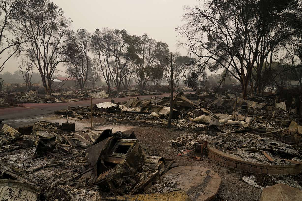 Rubble remains from an area destroyed by the Almeda Fire, Friday, Sept. 11, 2020, in Talent, Ore.
