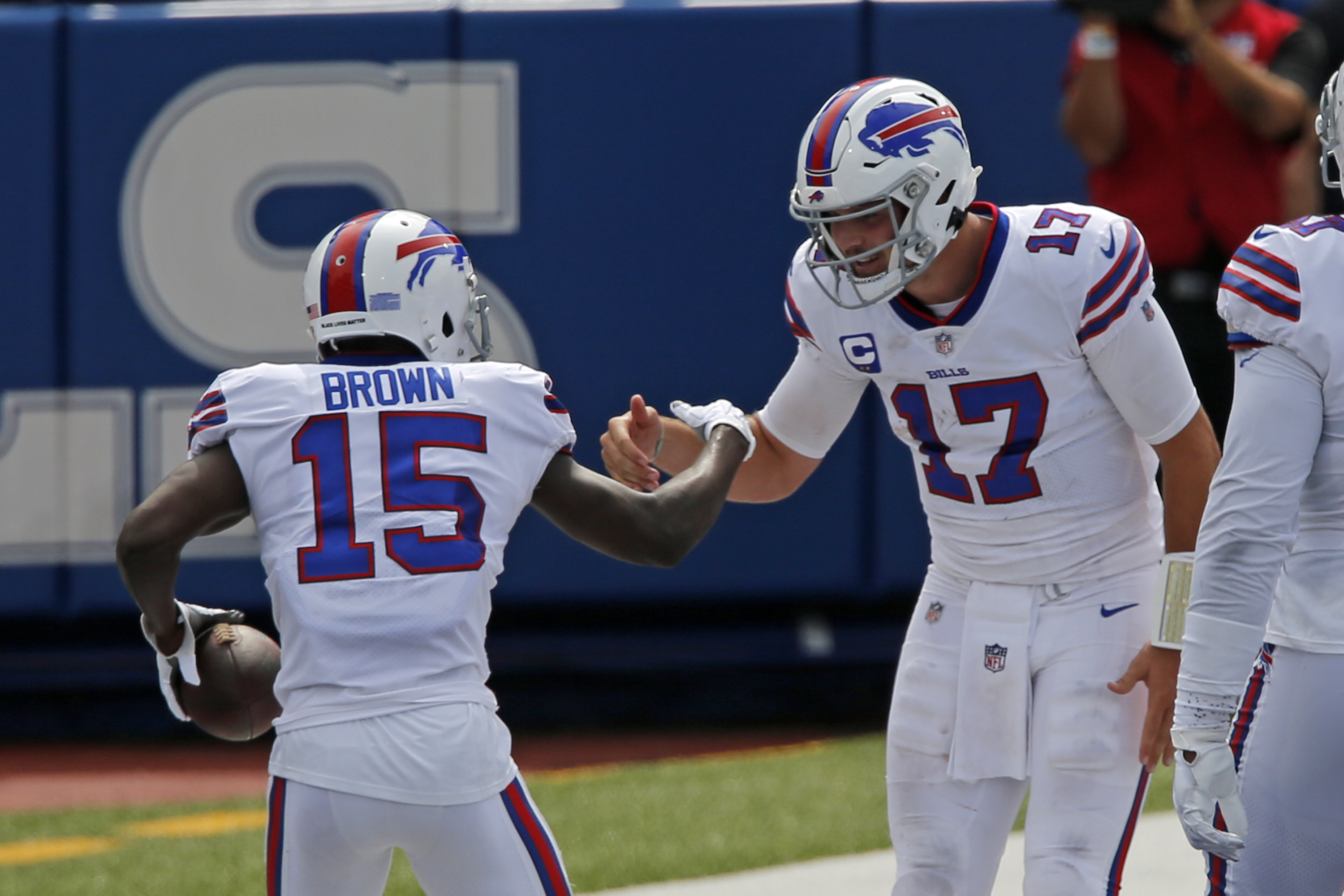 Buffalo Bills wide receiver John Brown (15) celebrates with quarterback Josh Allen after they connected on a pass play for a touchdown during the first half of an NFL football game against the New York Jets in Orchard Park, N.Y., Sunday, Sept. 13, 2020.