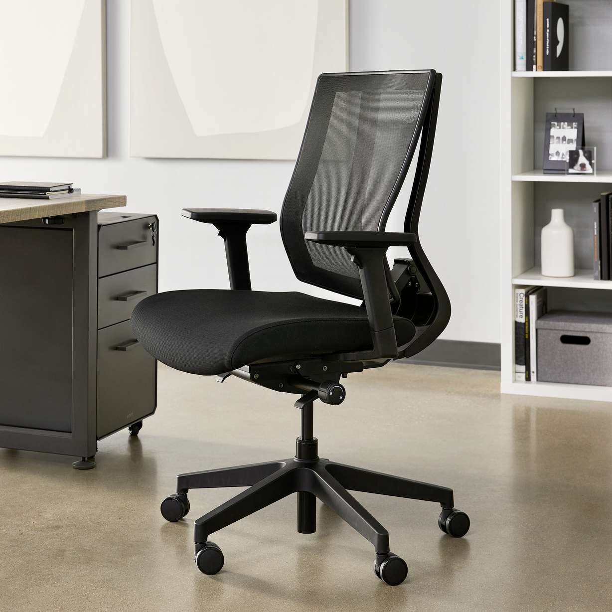 The Task Chair can accommodate most folks, as its seat raises up to 22 inches high and has a weight capacity of 300 pounds.
