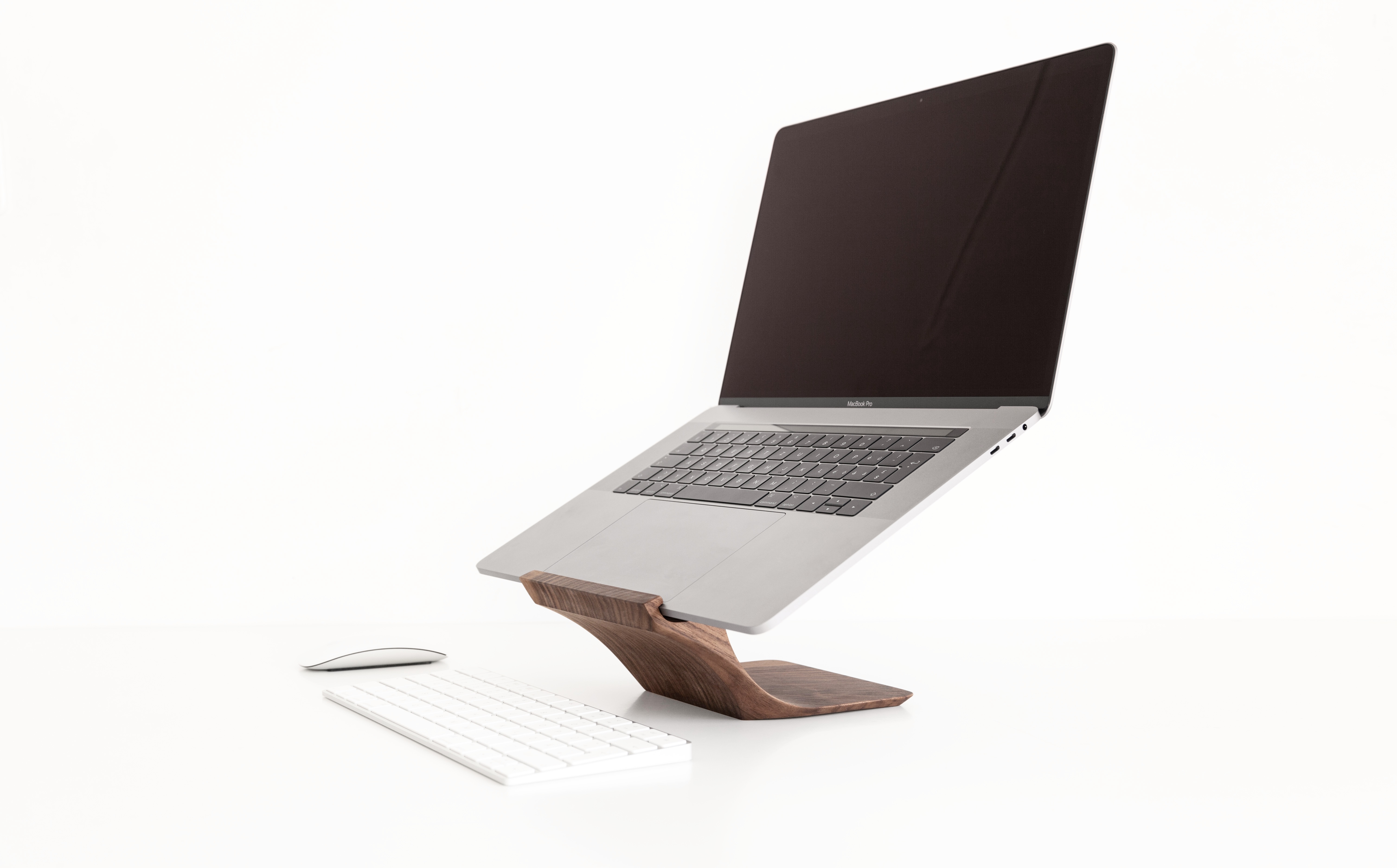 This gorgeous product from Yohann solves the first problem by being one of the world’s lightest and smallest computer stands.