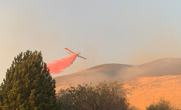 Wildfire updates: New fire sparks near University of Utah; evacuations lifted but 12 homes remain on standby 
