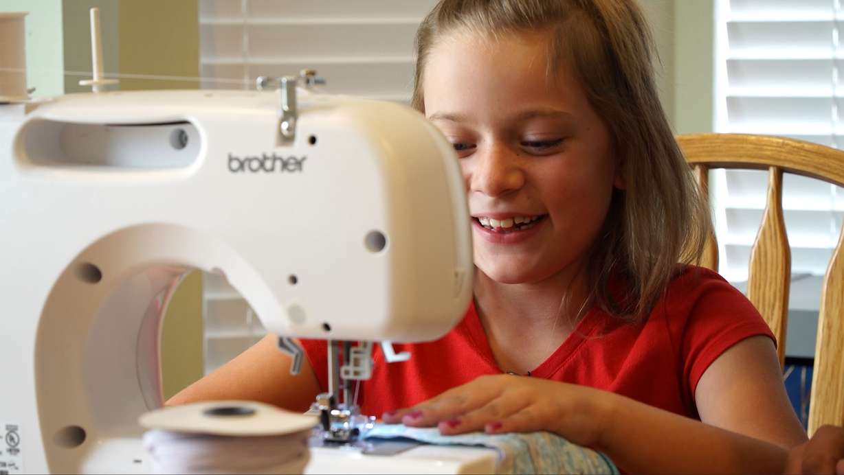 Eight-year-old Valerie Lloyd and her mom have sewn well over 100 masks.