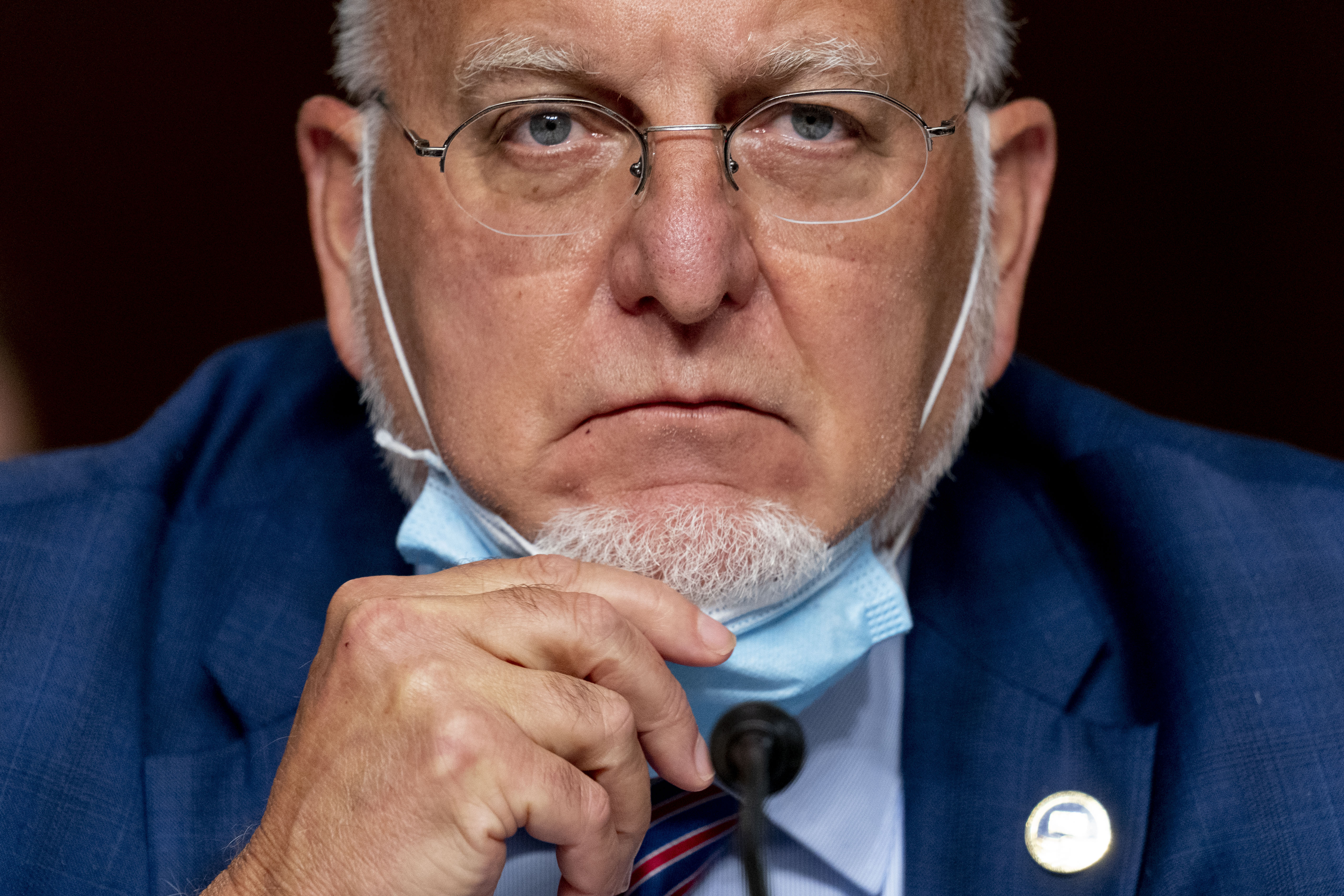Centers for Disease Control and Prevention Director Dr. Robert Redfield pauses while speaking at a Senate Appropriations subcommittee hearing on a "Review of Coronavirus Response Efforts" on Capitol Hill, Wednesday, Sept. 16, 2020, in Washington. (AP Photo/Andrew Harnik, Pool)