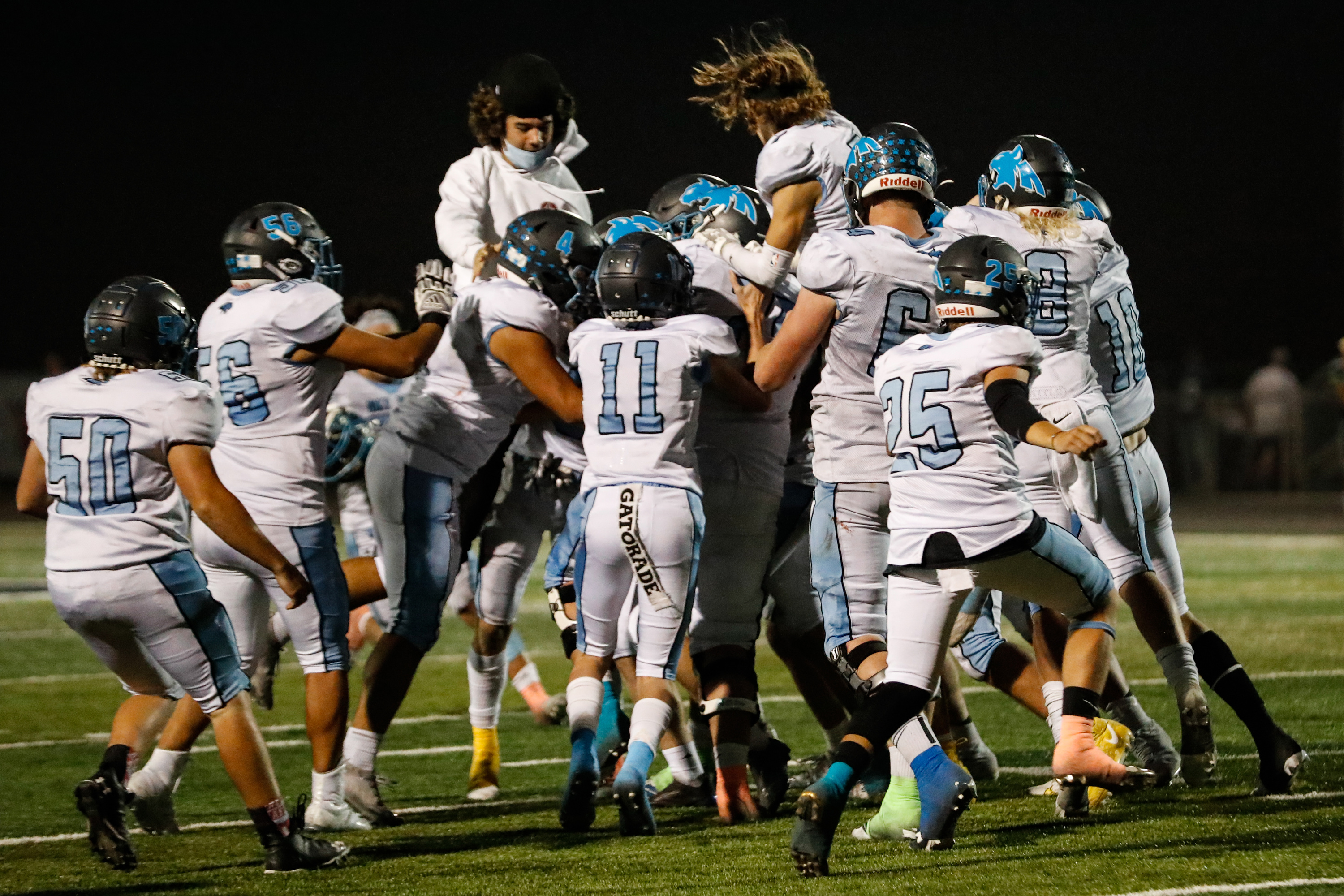 Sky View celebrates after their game-winning field goal during a high school football game at Ridgeline High School in Millville on Thursday, Sept. 17, 2020.