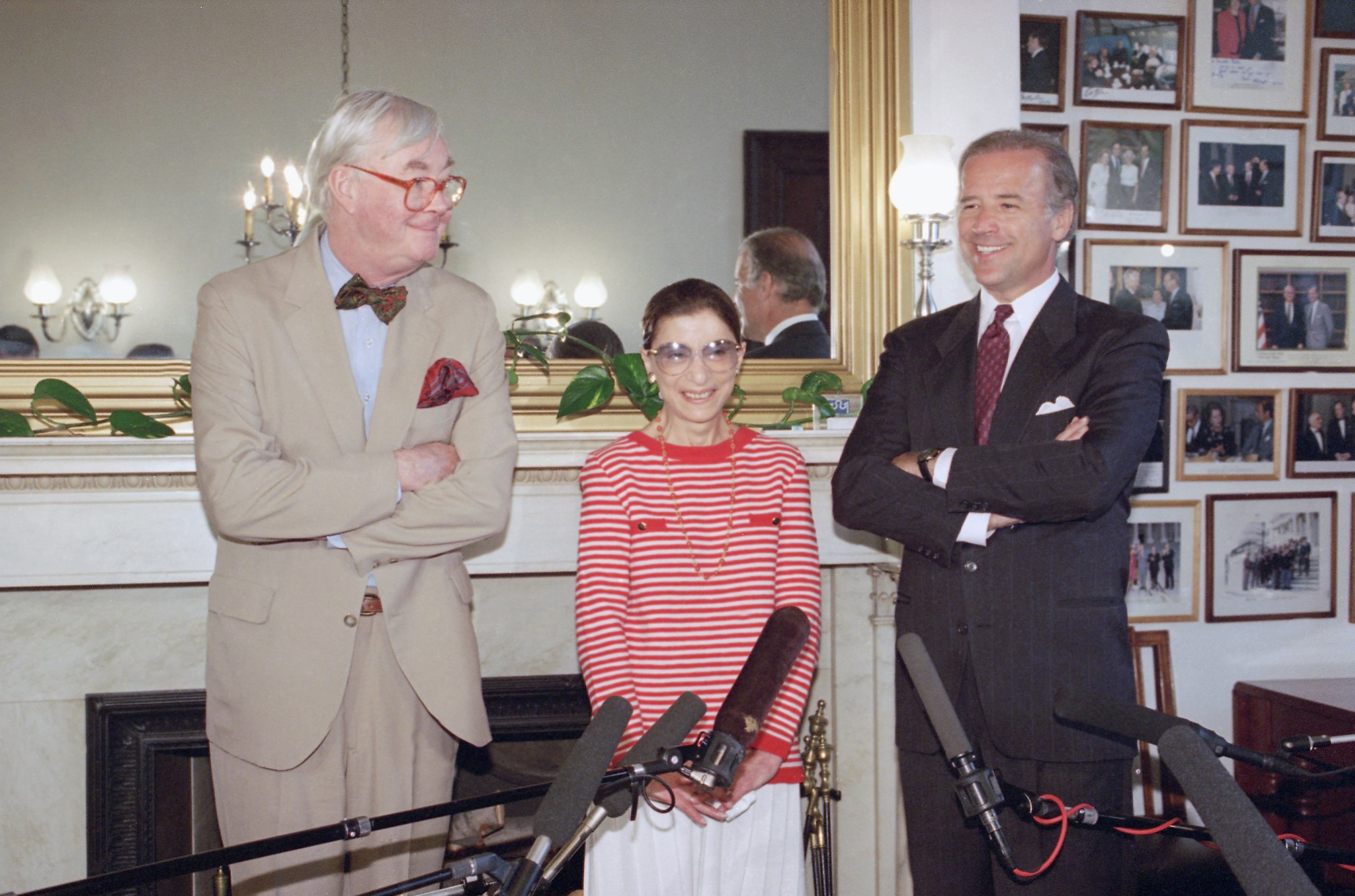 FILE - In this June 15, 1993, file photo, Judge Ruth Bader Ginsburg poses with Sen. Daniel Patrick Moynihan, D-N.Y., left, and Sen. Joseph Biden, D-Del., chairman of the Senate Judiciary Committee on Capitol Hill in Washington. The Supreme Court says Ginsburg has died of metastatic pancreatic cancer at age 87.