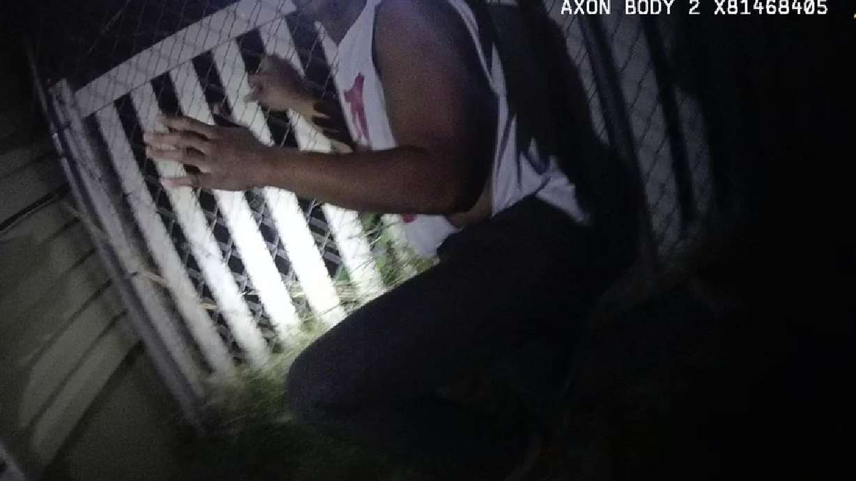 Jeffery Ryans is seen in police body camera footage recorded Friday, April 24, 2020. Ryans was bit by a police K-9 after he was already kneeling with his hands in the air, prosecutors say. Officer Nickolas Pearce is charged with aggravated assault.