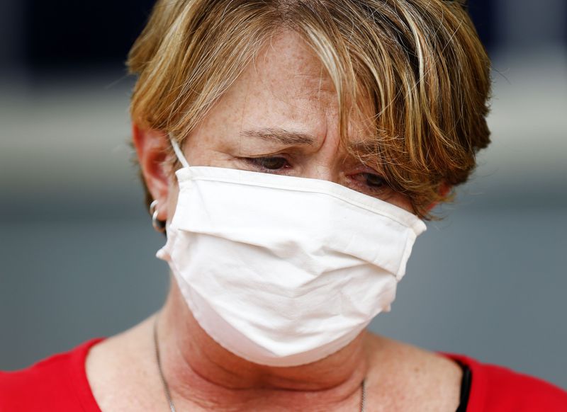 Julie Beane, a Corner Canyon High School teacher, becomes emotional while discussing the health of her friend and co-worker Charri Jensen, who is in the intensive care unit on a ventilator due to COVID-19. Beane stood outside the Canyons School District Board of Education meeting in Sandy on Friday, Sept. 18, 2020, voicing her desire for the school board to make clearer guidelines as to how Canyons district schools should determine school closures during a COVID-19 outbreak.