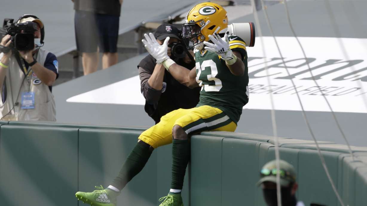 Jones' big day helps Packers beat Lions 42-21 in home opener