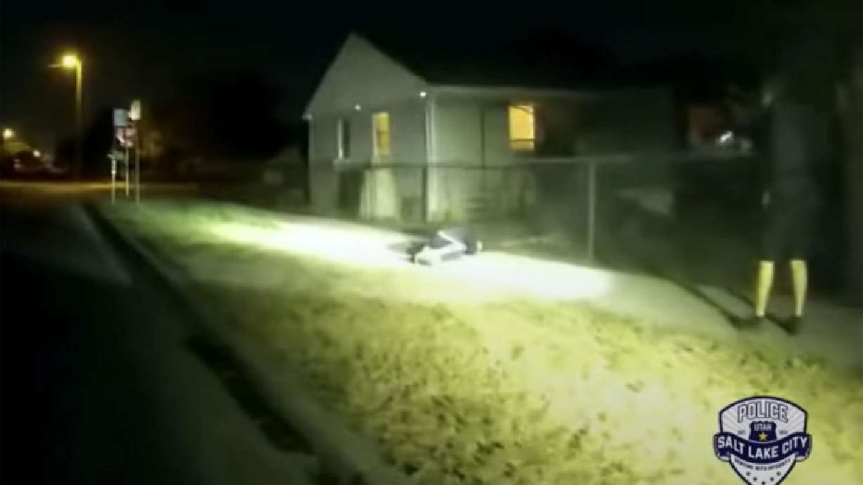 Linden Cameron, 13, lies on the ground after being shot by a Salt Lake police officer on Sept. 4, 2020. The officer was not legally justified in shooting the unarmed autistic boy, but the district attorney said Friday no charges will be filed against the officer.